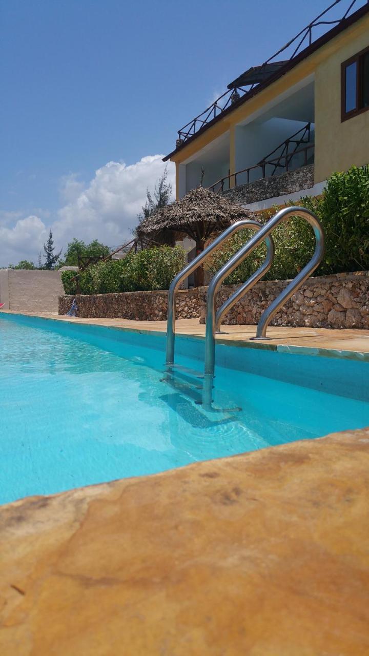 Jua Apartments كيوينجوا المظهر الخارجي الصورة